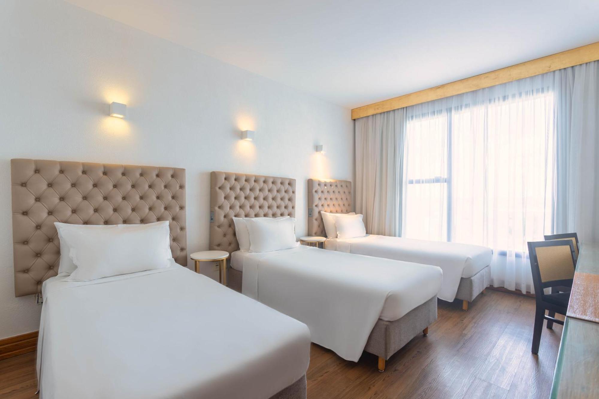 Ouro Minas Hotel Belo Horizonte, Dolce By Wyndham Екстер'єр фото A room at the hotel