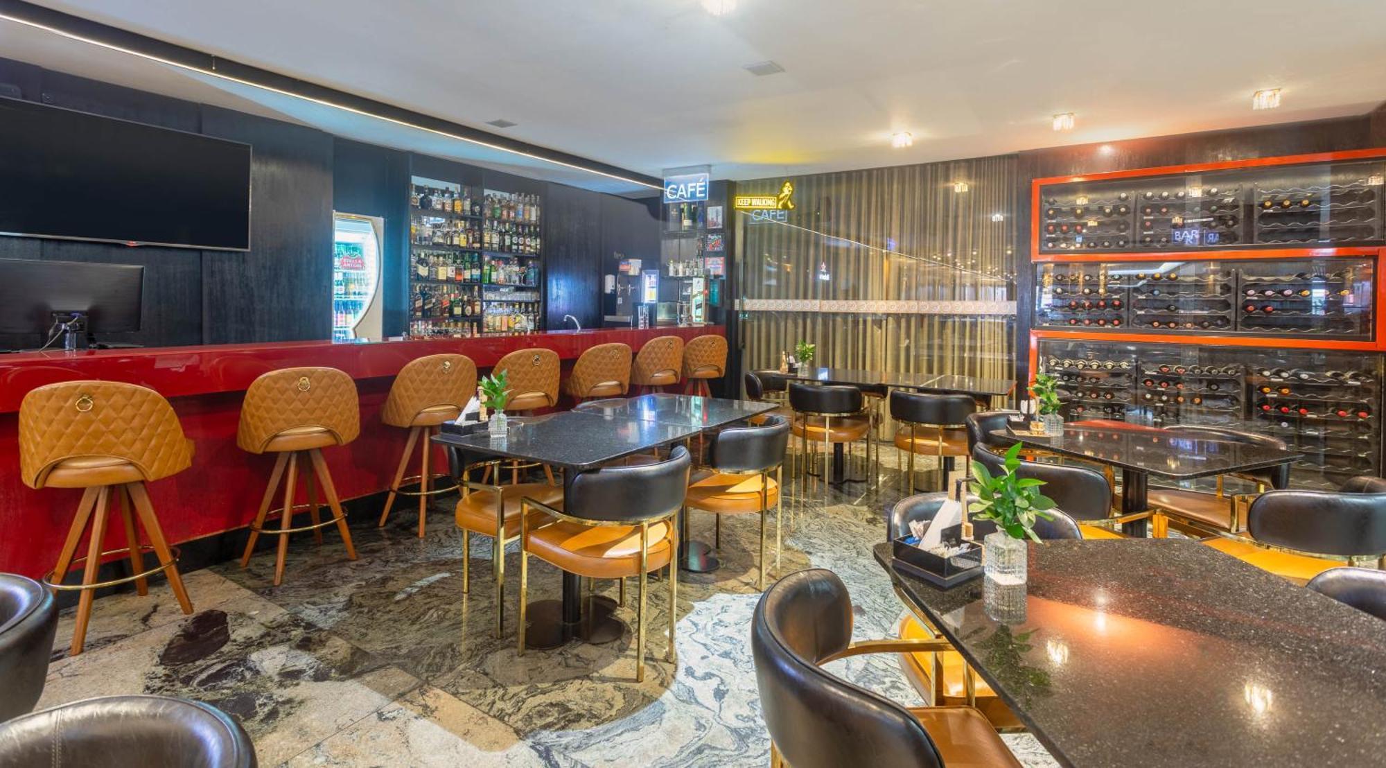 Ouro Minas Hotel Belo Horizonte, Dolce By Wyndham Екстер'єр фото The interior of the bar