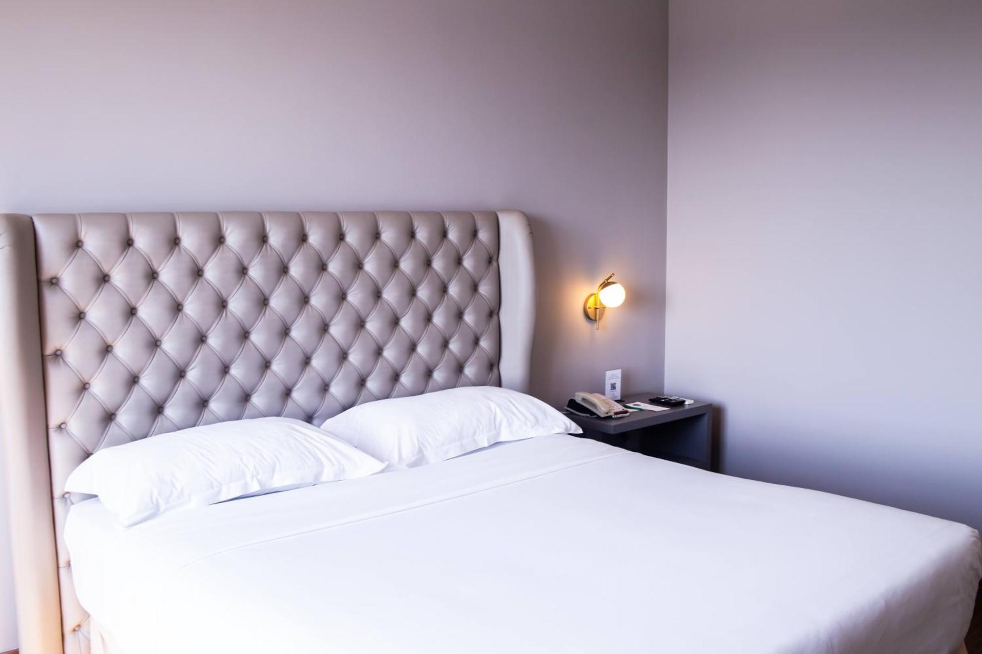 Ouro Minas Hotel Belo Horizonte, Dolce By Wyndham Екстер'єр фото A bedroom at the hotel
