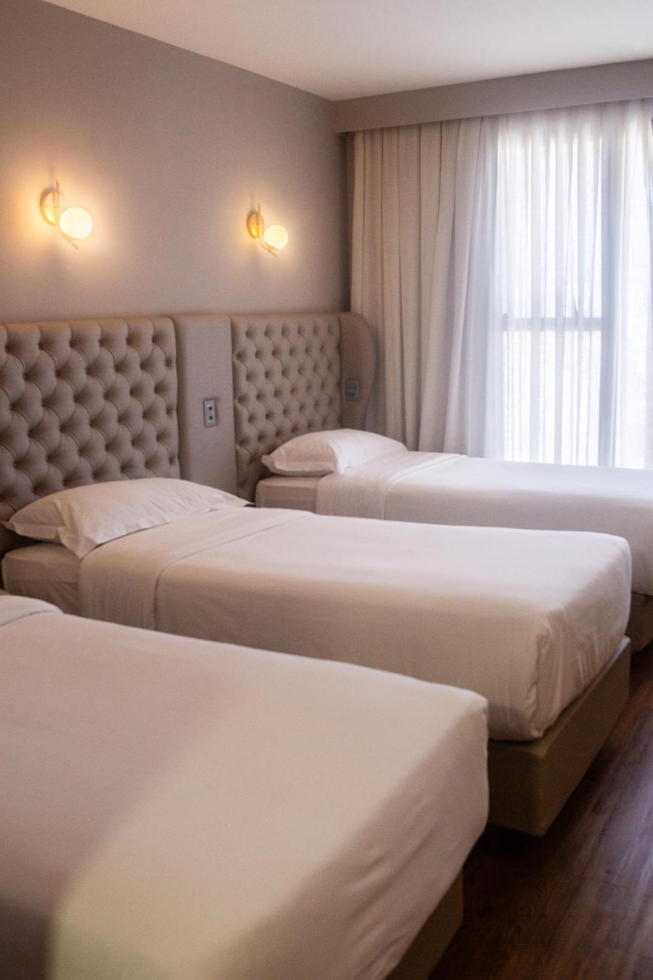 Ouro Minas Hotel Belo Horizonte, Dolce By Wyndham Екстер'єр фото A room at the hotel